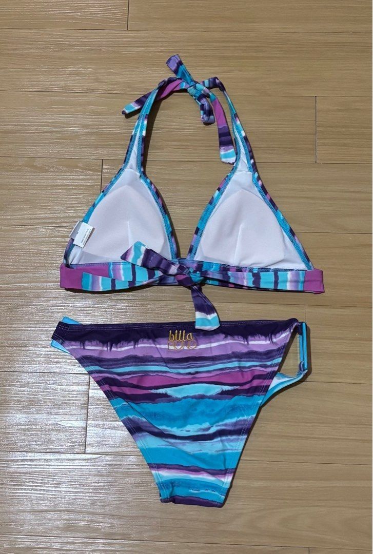 Billabong Bikini Set Medium (Category: Bikinis & Swimsuits) located in Quezon City. Submitted by garagesale2026 (Listing ID 1463870719, Image 2). Description: - Unused, no more tag - Original from US - Colorful pattern: Purple, Blue, Turquoise - Halter top with neck and back ties - Matching bottoms with side details.