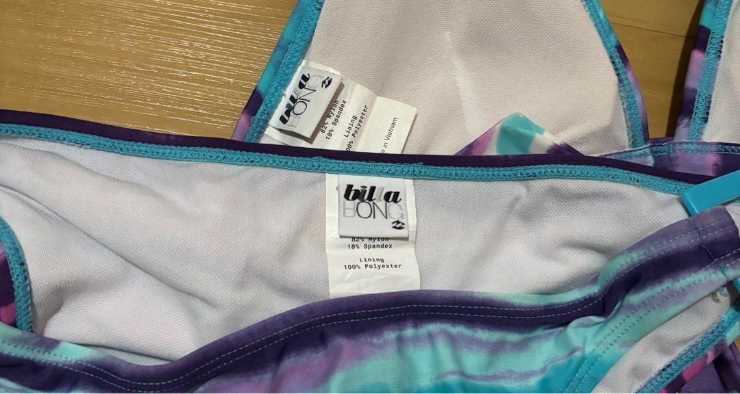 Billabong Bikini Set Medium (Category: Bikinis & Swimsuits) located in Quezon City. Submitted by garagesale2026 (Listing ID 1463870719, Image 3). Description: - Unused, no more tag - Original from US - Colorful pattern: Purple, Blue, Turquoise - Halter top with neck and back ties - Matching bottoms with side details.