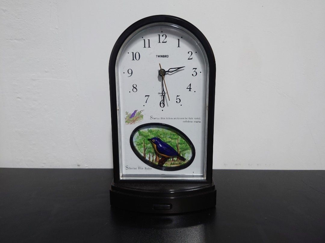 Bird Table Clock (Category: Clocks) located in General Trias. Submitted by mervcorner (Listing ID 1463927210, Image 1). Description: Chimes every hour (moving and tweeting bird) reminding you that every time is gold. Brand: Twinbird Quartz Made in Japan Clear Loud Sound Powered by 4 AA Batteries (Included - 3x Non Rechargable + 1x Rechargable) Well used and accurate in time. No issue. FIXED PRICE. RFS: Decluttering Item Location: General Trias, C
