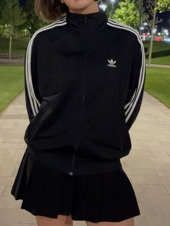 Black Adidas Track Jacket (Category: Coats, Jackets and Outerwear) located in Las Pinas. Submitted by kylloren_ (Listing ID 1460432724, Image 1). Description: - rfs: decluttering - armpit to armpit 22” - length from collar 25” helping tags [h&m, mango, zara, uniqlo, brandy melville, princess polly, y2k, coquette, dainty, vintage, early 2000s, grunge, cottagecore, basics, preppy, goth, fairycore, fairy, edikted, hollister, miu the label, isa the l