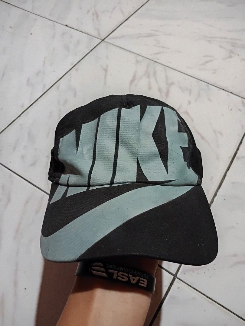 Black Cap with Grey Graphic Design (Category: Caps & Hats) located in Cebu City. Submitted by zoshua3 (Listing ID 1463829288, Image 1). Description: NIKE CAP ISSUE: change snap % colored by tie dye.