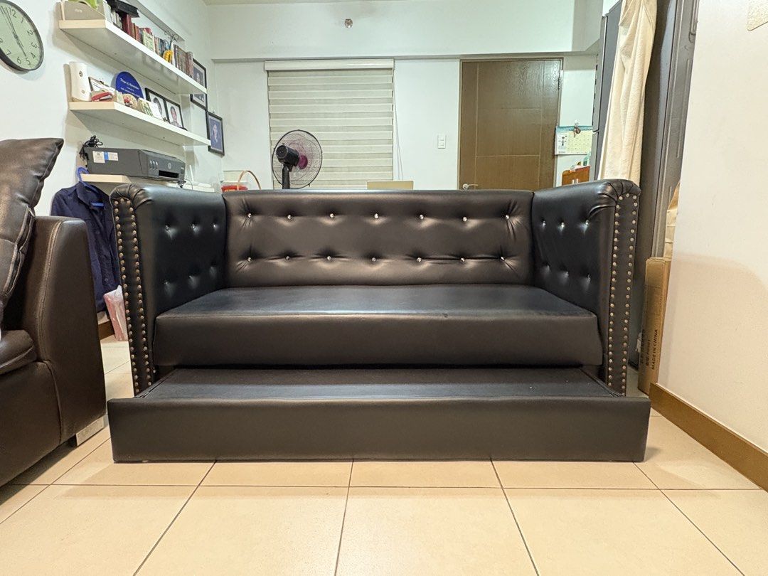 Black Faux Leather Tufted Sofa Bed with Pull-Out (Category: Sofas) located in Taguig. Submitted by vibrantcarlie_2.0 (Listing ID 1463799108, Image 1). Description: - Ideal for small spaces or guest rooms - Easily converts from sofa to bed Length: 66 inches Width: 33 inches Shipping fee C/o buyer .