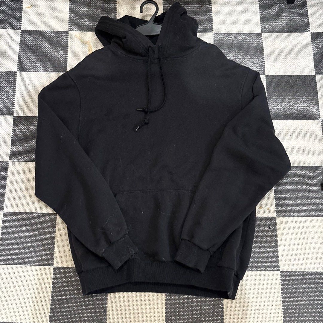 Black Hoodie (Category: Coats, Jackets and Outerwear) located in Makati City. Submitted by sseurekiii (Listing ID 1463755971, Image 1). Description: - Classic black hoodie - Long sleeves with elastic cuffs - Adjustable drawstring at the neckline - Comfortable for daily wear - Pre-loved and ready for a new home.