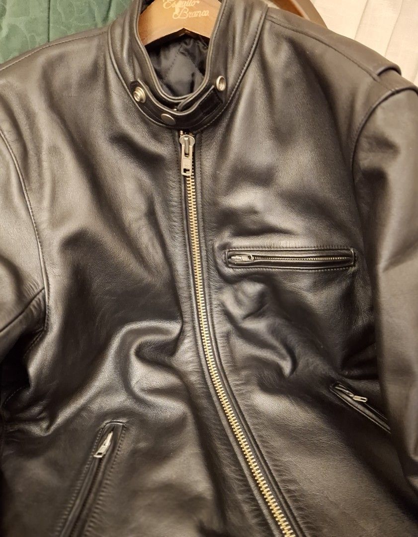 Black Leather Cafe Racer Jacket with Zip Pockets (Category: Coats, Jackets and Outerwear) located in Baguio. Submitted by give_fad15730 (Listing ID 1463851593, Image 3). Description: Shoulder:17in. W:20.5in. L:25in. Arm L:25in. -Quality soft steerhide leather - Classic black leather biker jacket - Zip-up front closure - Multiple zip pockets for secure storage - Snap-button collar for adjustable style - Ideal for layering over shirts - Pairs perfe