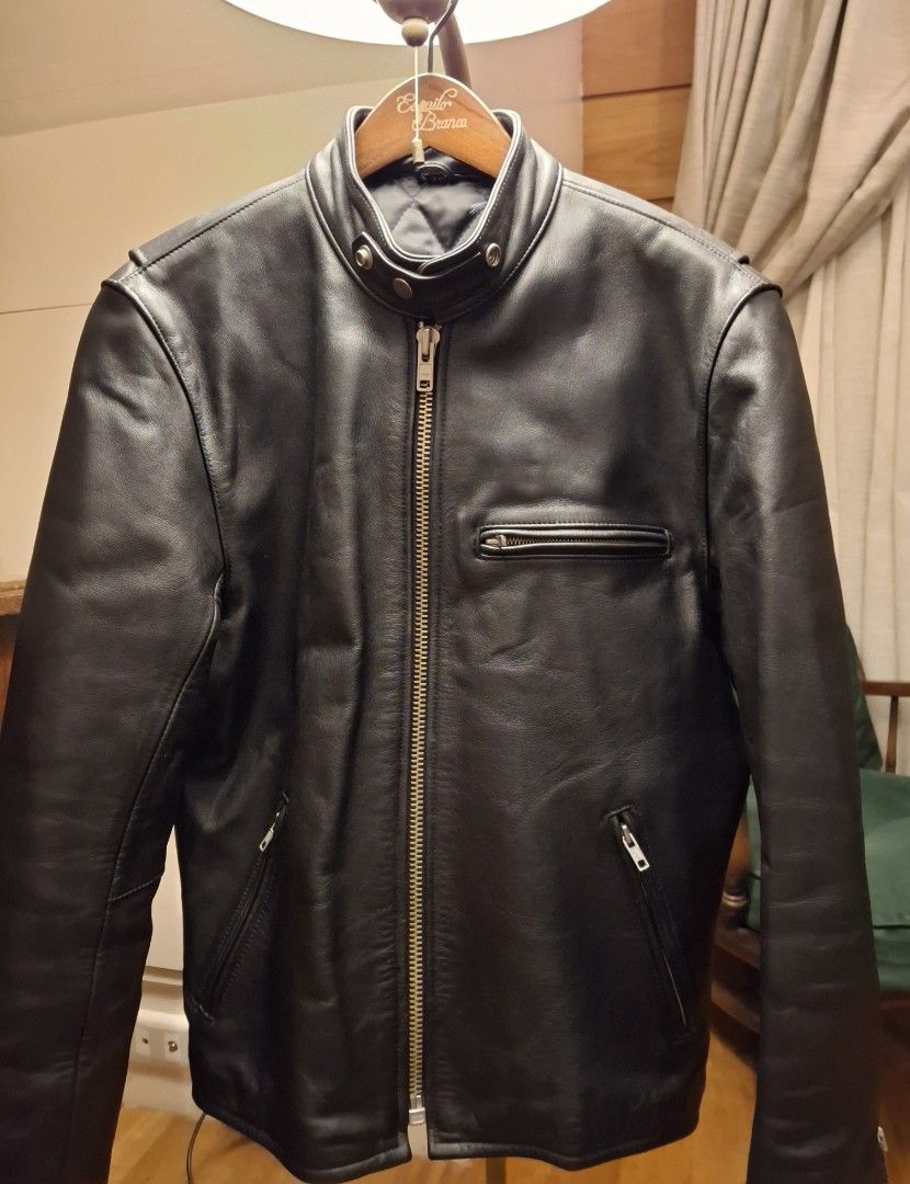 Black Leather Cafe Racer Jacket with Zip Pockets (Category: Coats, Jackets and Outerwear) located in Baguio. Submitted by give_fad15730 (Listing ID 1463851593, Image 1). Description: Shoulder:17in. W:20.5in. L:25in. Arm L:25in. -Quality soft steerhide leather - Classic black leather biker jacket - Zip-up front closure - Multiple zip pockets for secure storage - Snap-button collar for adjustable style - Ideal for layering over shirts - Pairs perfe