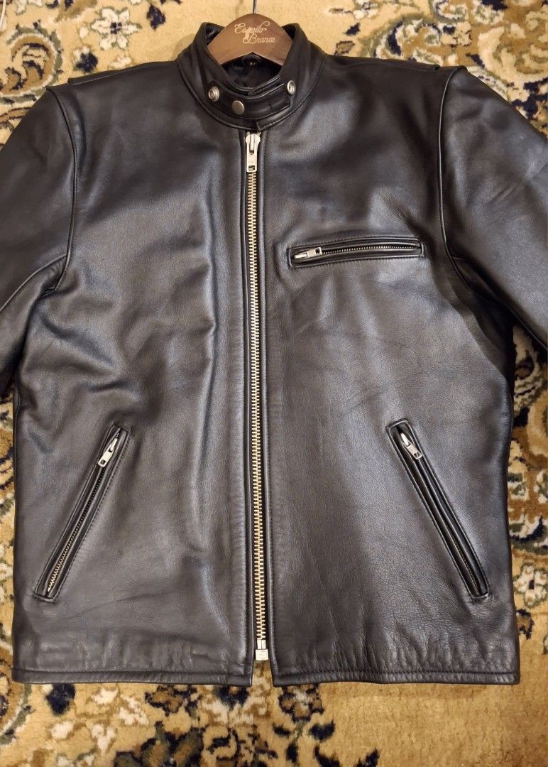 Black Leather Cafe Racer Jacket with Zip Pockets (Category: Coats, Jackets and Outerwear) located in Baguio. Submitted by give_fad15730 (Listing ID 1463851593, Image 2). Description: Shoulder:17in. W:20.5in. L:25in. Arm L:25in. -Quality soft steerhide leather - Classic black leather biker jacket - Zip-up front closure - Multiple zip pockets for secure storage - Snap-button collar for adjustable style - Ideal for layering over shirts - Pairs perfe