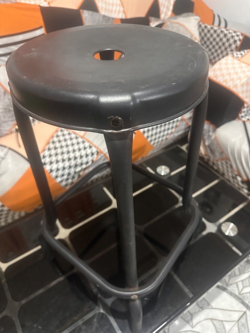 Black Metal Bar Stool (Category: Chairs) located in Manila. Submitted by zuripot0726 (Listing ID 1463832192, Image 3). Description: - Sleek black metal bar stool - Features a comfortable circular seat - Sturdy construction with four legs - Integrated footrest for added comfort - Simple and modern design - Ideal for kitchen counters or bar areas - Good overall condition with minor cosmetic scuffs from normal use - 24.5in height ⚠️ already been rep