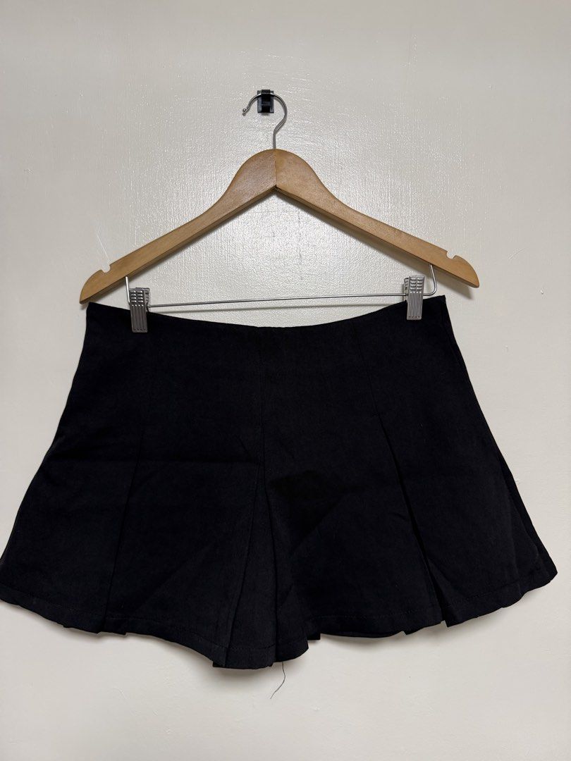 Black Pleated Mini Skort (Category: Skirts) located in Manila. Submitted by don_p (Listing ID 1463868275, Image 1). Description: XL to 2XL - Black pleated mini skirt - High-waisted design - Fits size Small to Medium (approx.) - Versatile for casual or dressed-up looks - Easy to style with various tops - Classic and simple aesthetic.