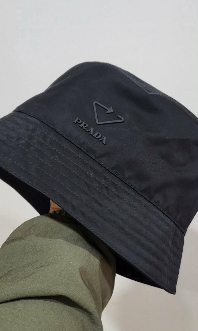Black Prada bucket hat original (Category: Luxury Apparel) located in Paranaque City. Submitted by nvdluxurygoods (Listing ID 1463926595, Image 2). Description: Legit, Prada bucket hat Authentic!! Hard to find No flaws, No issue. Hollywood and Kpop celebrity users large on tag but small, medium frame can wear it too. Trust me as I say, this is definitely a hit and gem! Imagine a PRADA in a lowest price? such a steal! Negotiable price but not too 