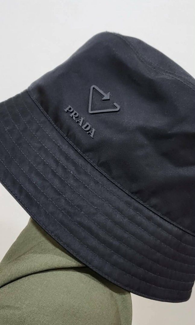 Black Prada bucket hat original (Category: Luxury Apparel) located in Paranaque City. Submitted by nvdluxurygoods (Listing ID 1463926595, Image 3). Description: Legit, Prada bucket hat Authentic!! Hard to find No flaws, No issue. Hollywood and Kpop celebrity users large on tag but small, medium frame can wear it too. Trust me as I say, this is definitely a hit and gem! Imagine a PRADA in a lowest price? such a steal! Negotiable price but not too 