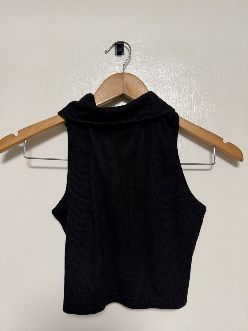 SHEIN - Black Ribbed Collared Sleeveless Crop Top (Category: Sleeveless) located in Manila. Submitted by don_p (Listing ID 1463865525, Image 2). Description: XS TO S - Black ribbed crop top - Sleeveless design - Collared neckline - Two small front buttons - Ideal for pairing with high-waisted bottoms - Comfortable and stylish for casual wear.