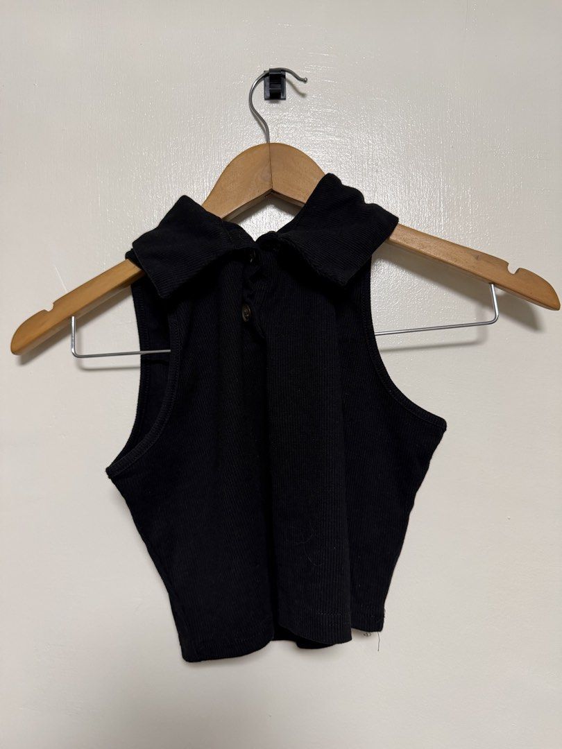 SHEIN - Black Ribbed Collared Sleeveless Crop Top (Category: Sleeveless) located in Manila. Submitted by don_p (Listing ID 1463865525, Image 1). Description: XS TO S - Black ribbed crop top - Sleeveless design - Collared neckline - Two small front buttons - Ideal for pairing with high-waisted bottoms - Comfortable and stylish for casual wear.