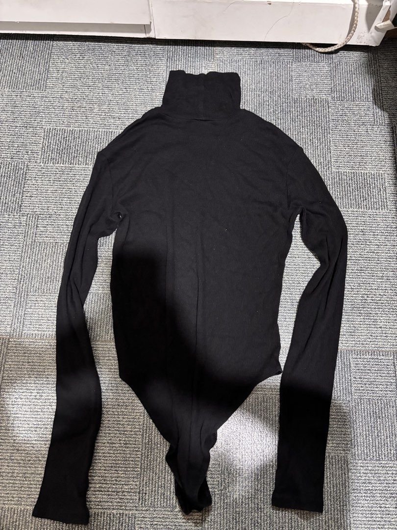 Black Ribbed Turtleneck Bodysuit Top — Size S (Category: Longsleeves) located in Manila. Submitted by cecesprelovedthings (Listing ID 1463900556, Image 3). Description: Selling this classic black ribbed turtleneck bodysuit 🖤 Perfect for casual outfits, layering, or a more fitted/clean look. * Fitted silhouette * Ribbed/stretchy fabric * High-neck / turtleneck design * Long sleeves * Black — easy to pair with almost anything * Bodysuit bottom for