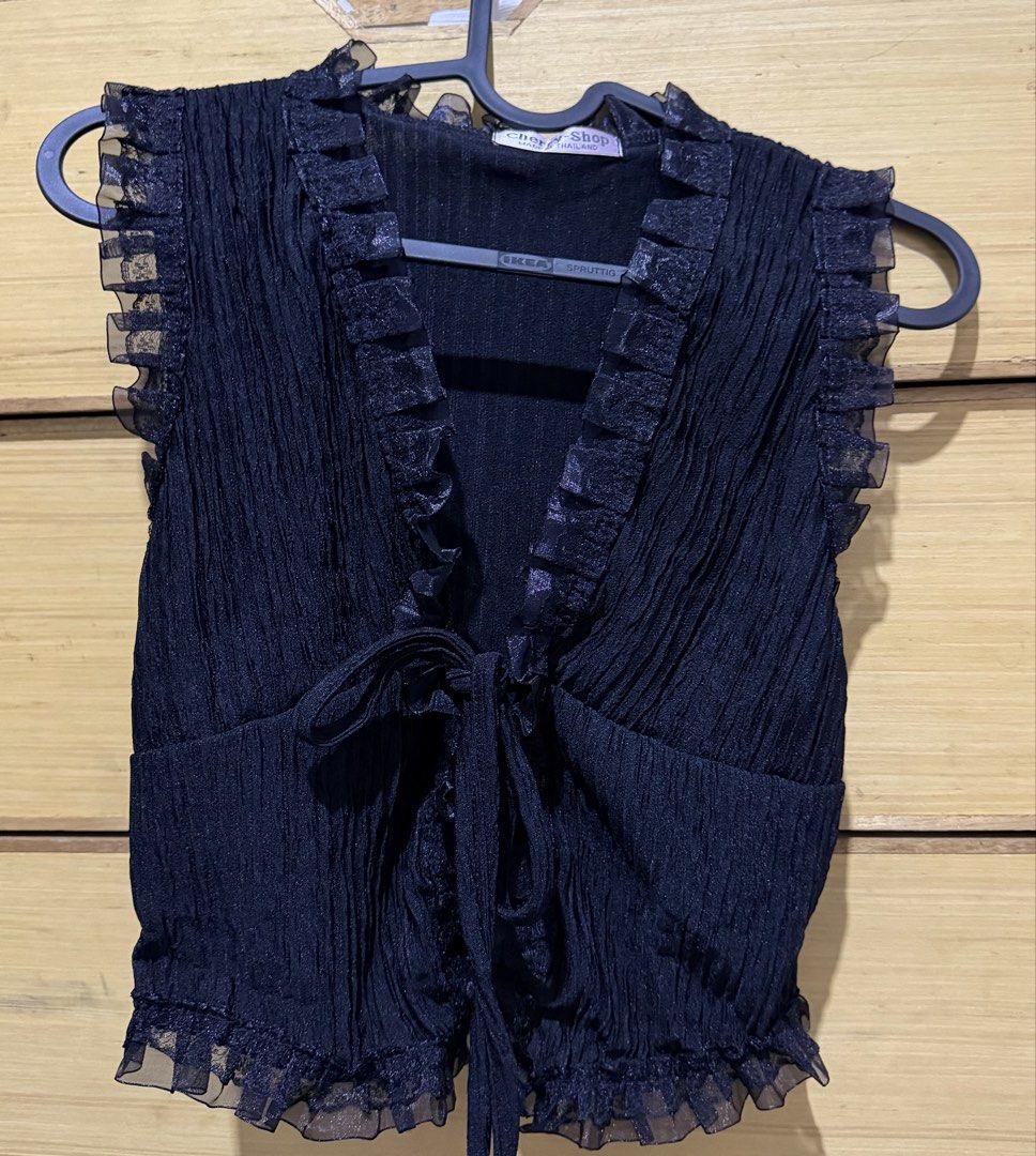 Black Sheer Ruffled Tie-Front Crop Top (Category: Sleeveless) located in Tarlac. Submitted by paperlyx (Listing ID 1463856588, Image 1). Description: Black Sheer Ruffled Tie-Front Crop Top - Fits XS to semi-small frames - Front ribbon tie closure - Bought from Bangkok, Thailand - Never worn, tried on only. RFS: Size too small.