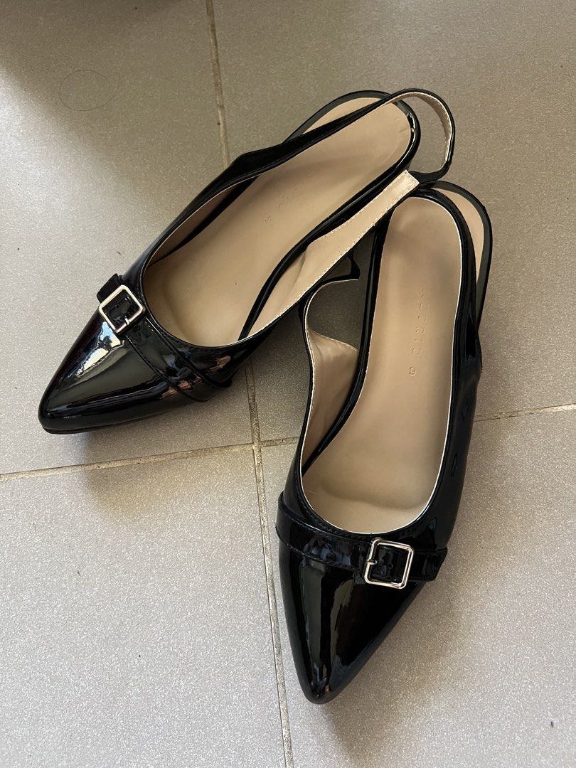 Black Slingback Heels with Buckle Detail (Category: Heels) located in Imus. Submitted by hphzrd333 (Listing ID 1463869276, Image 1). Description: - black patent leather slingback heels - in good condition, worn only once indoors - the strap is a little loose but not an issue.