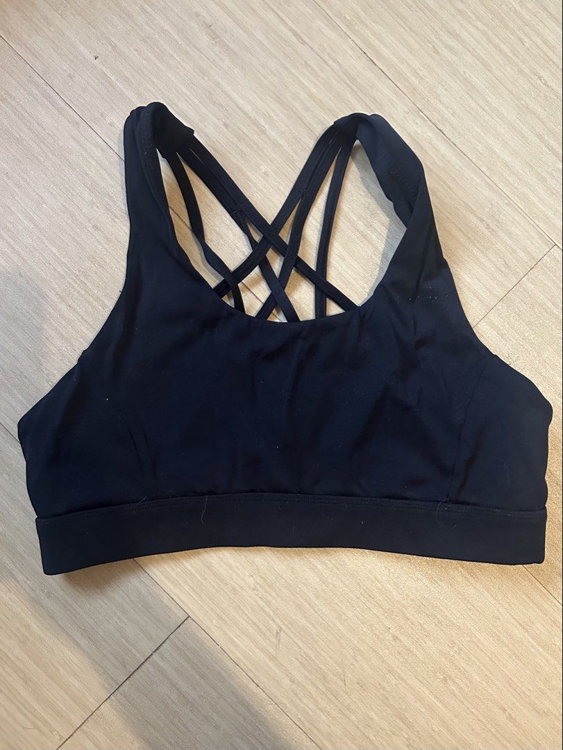 Black Strappy Sports Bra (Category: Activewear) located in Mandaluyong City. Submitted by youarecutejeans (Listing ID 1463818265, Image 2). Description: - Sleek black sports bra - Unique strappy back design - Comfortable and supportive for workouts - Elastic band for a secure, snug fit - Ideal for yoga, gym, and running - Effortlessly pairs with any leggings.