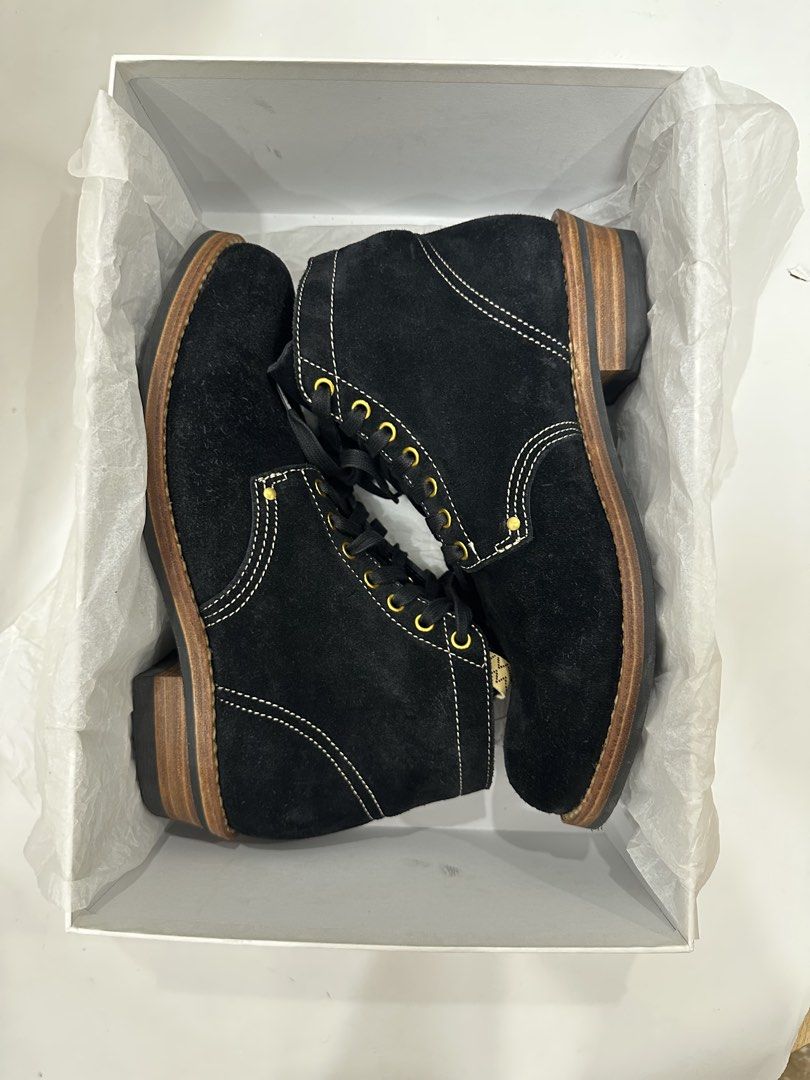 VISVIM Black Suede Lace-Up Boots (Category: Boots) located in Makati City. Submitted by 9thcolt (Listing ID 1463790966, Image 1). Description: - Black suede boots - White stitching detail - Lace-up front with gold eyelets - Wooden heel - Includes original box and tissue paper - Ideal for casual wear.