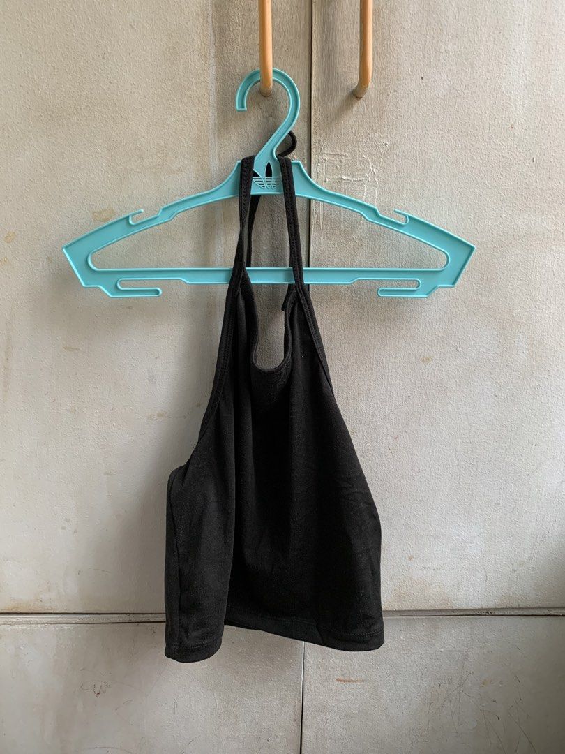 Black Tank Top (Category: Sleeveless) located in Manila. Submitted by usagichan_rabbit (Listing ID 1463782545, Image 1). Description: - Basic black tank top - Halter neck style - Soft fabric for comfort - Versatile for layering or wearing solo - Effortlessly matches any outfit - Ideal for casual occasions Small.