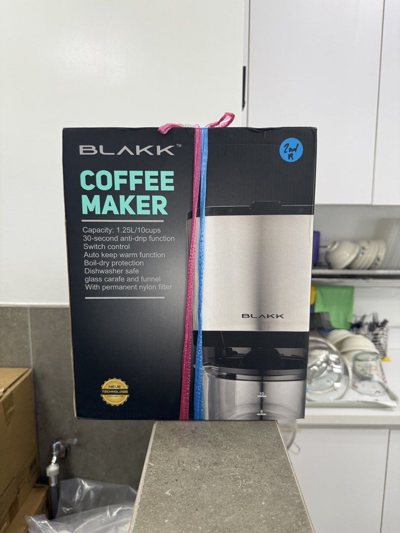 BLAKK Coffee Maker 1.25L with Anti-Drip and Keep Warm Function (Category: Coffee Machines & Makers) located in Quezon City. Submitted by akestrella (Listing ID 1463746626, Image 1). Description: - Brews up to 10 cups (1.25L) of coffee - 30-second anti-drip function - Auto keep warm feature - Boil-dry protection for safety - Dishwasher safe glass carafe and funnel - Includes permanent nylon filter - Comes with a Neue Technologie sticker.
