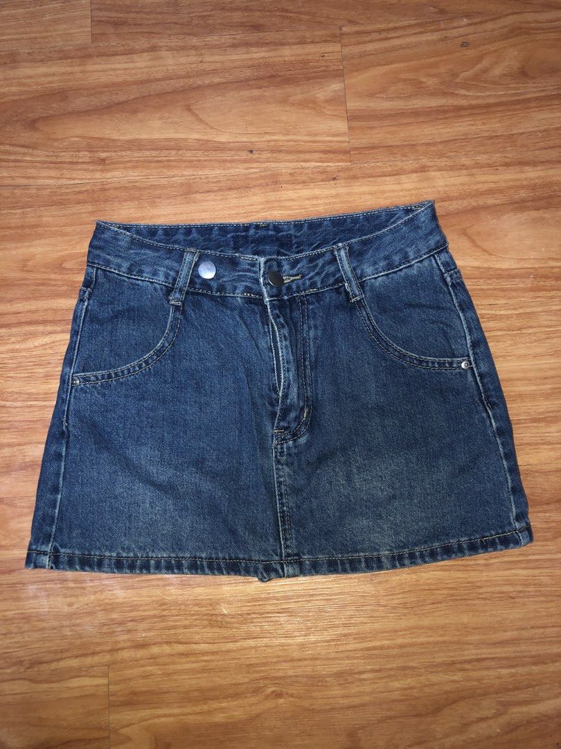 Blue Denim Mini Skirt with Shorts Underlay (Category: Skirts) located in Manila. Submitted by zhala_dawn3 (Listing ID 1463746237, Image 1). Description: Cute blue denim mini skirt with built-in shorts. Features classic five-pocket styling, button/zip closure. Perfect for casual outfits..
