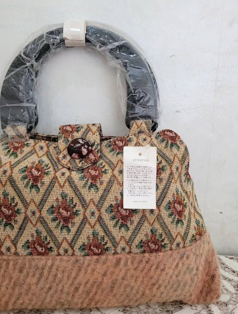 Bnew Tapestry Handbag (Category: Purses & Pouches) located in Balanga. Submitted by marae_c (Listing ID 1463754784, Image 2). Description: In very good condition. New, unused. Very pretty in actual. Wooden hard handles with inner lining. Snap button closure. Fits your essentials. Kasya mini payong. Gandaa 💗 small to semi med size bag pero spacious enough naman for daily..