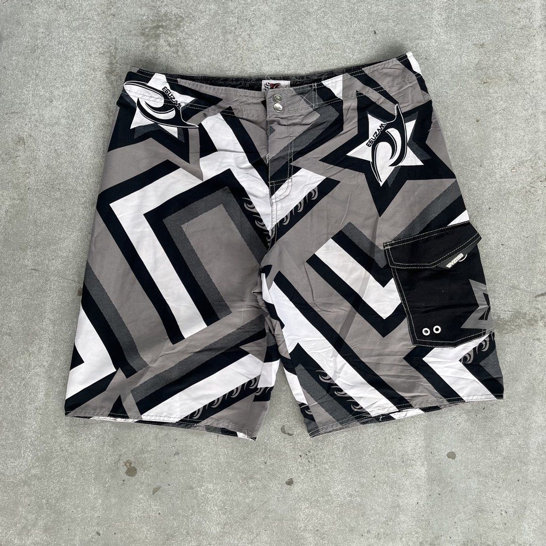 Board short Pattern (Category: Swim Trunks & Board Shorts) located in General Mariano Alvarez. Submitted by aaronatas819577 (Listing ID 1463770462, Image 1). Description: - O'Neill Board Shorts - Size: XL - Color: Black, white, and grey geometric pattern - Features: Cargo pocket on right side with velcro closure - Closure: Button and zip fly - Ideal for: Swimming, lounging, beach, or pool activities.