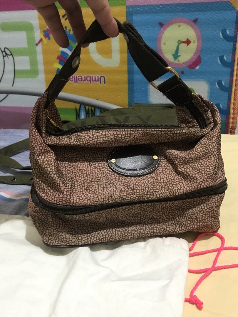 Borbonese (Category: Purses & Pouches) located in Balete No 2. Submitted by troyesybang (Listing ID 1463889356, Image 1). Description: Nylon pouch with bottom compartment Nonisyu no damage light use only semi like new pa Auth borbonese Handbag style .