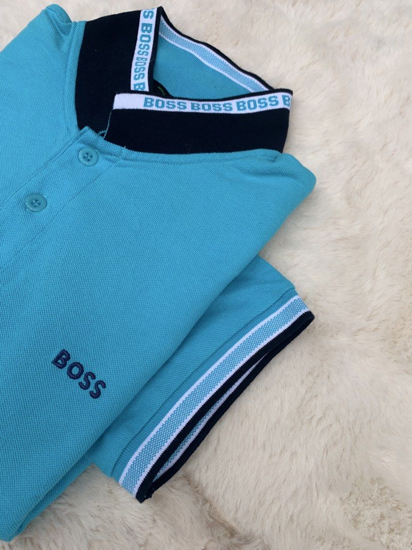 BOSS Regular Fit Polo Shirt - Turquoise (Category: Tshirts & Polo Shirts ) located in Cateel. Submitted by janicegpad45049 (Listing ID 1463880895, Image 3). Description: - Brand: BOSS - Color: Turquoise - Size: L - Fit: Regular - Features: Embroidered BOSS logo on chest, contrasting stripe detail on collar and sleeve cuffs - Style: Casual wear.