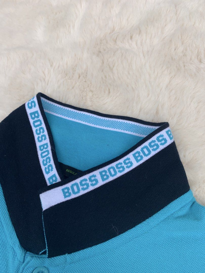 BOSS Regular Fit Polo Shirt - Turquoise (Category: Tshirts & Polo Shirts ) located in Cateel. Submitted by janicegpad45049 (Listing ID 1463880895, Image 2). Description: - Brand: BOSS - Color: Turquoise - Size: L - Fit: Regular - Features: Embroidered BOSS logo on chest, contrasting stripe detail on collar and sleeve cuffs - Style: Casual wear.
