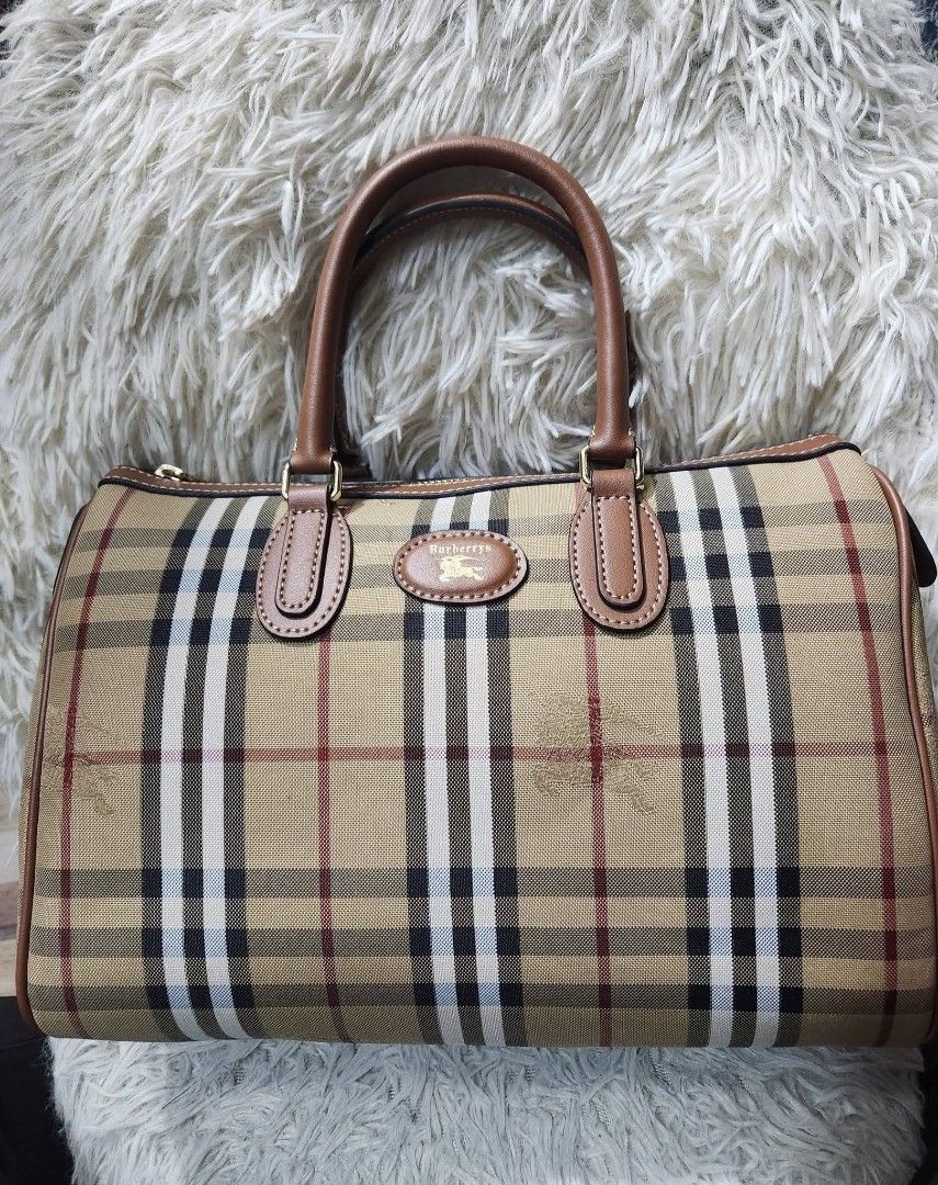Boston Burberry (Category: Luxury Bags & Wallets) located in Baguio. Submitted by swiftstone_d709db (Listing ID 1463842037, Image 1). Description: Boston Burberrry .....