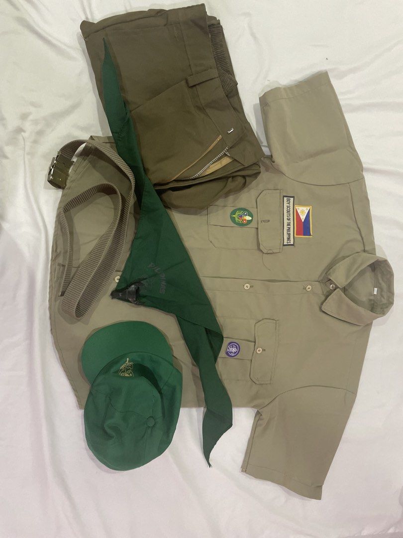 Boy Scout uniform (Category: Babies & Kids Fashion) located in Manila. Submitted by chocolatesundaeee (Listing ID 1463848973, Image 1). Description: - Complete Boy Scouts of the Philippines uniform set - Includes khaki shirt with patches and flag - Matching pants - Green neck scarf - Green cap - Belt included - Official BSP merchandise - Great for scouting activities and events.
