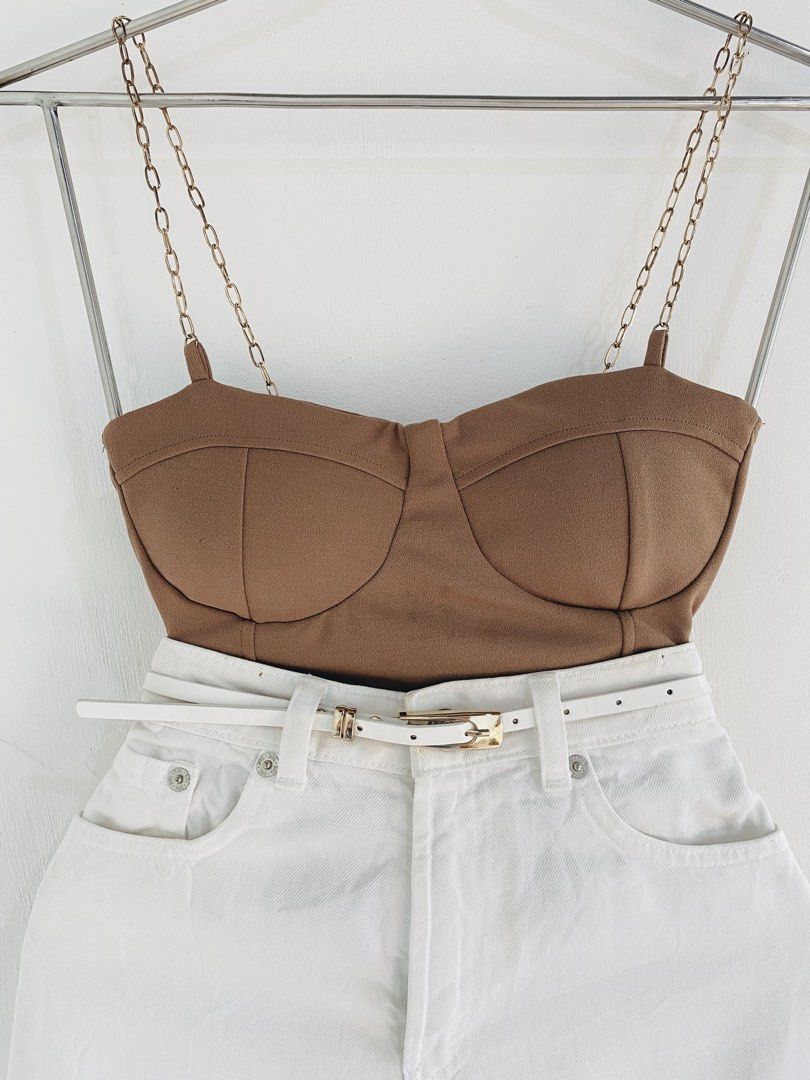 Brown Bustier Top & White Denim Shorts Set (Category: Sets or Coordinates) located in Vigan. Submitted by yourcloset1001 (Listing ID 1463914368, Image 3). Description: - Cute brown bustier top with stylish chain straps. - High-waisted white denim shorts with a trendy frayed hem. - Includes a white belt with a chic gold buckle. - Versatile outfit for casual outings or nights out. - Mix and match pieces with your existing wardrobe..