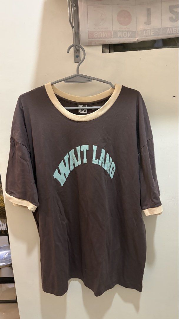 Brown "WAIT LANG" Ringer T-shirt (Category: Tshirts & Polo Shirts ) located in Davao. Submitted by davaodeclutters (Listing ID 1463765013, Image 1). Description: - Brown ringer tee - Light blue "WAIT LANG" graphic - 2XL 24x30 - twice used.