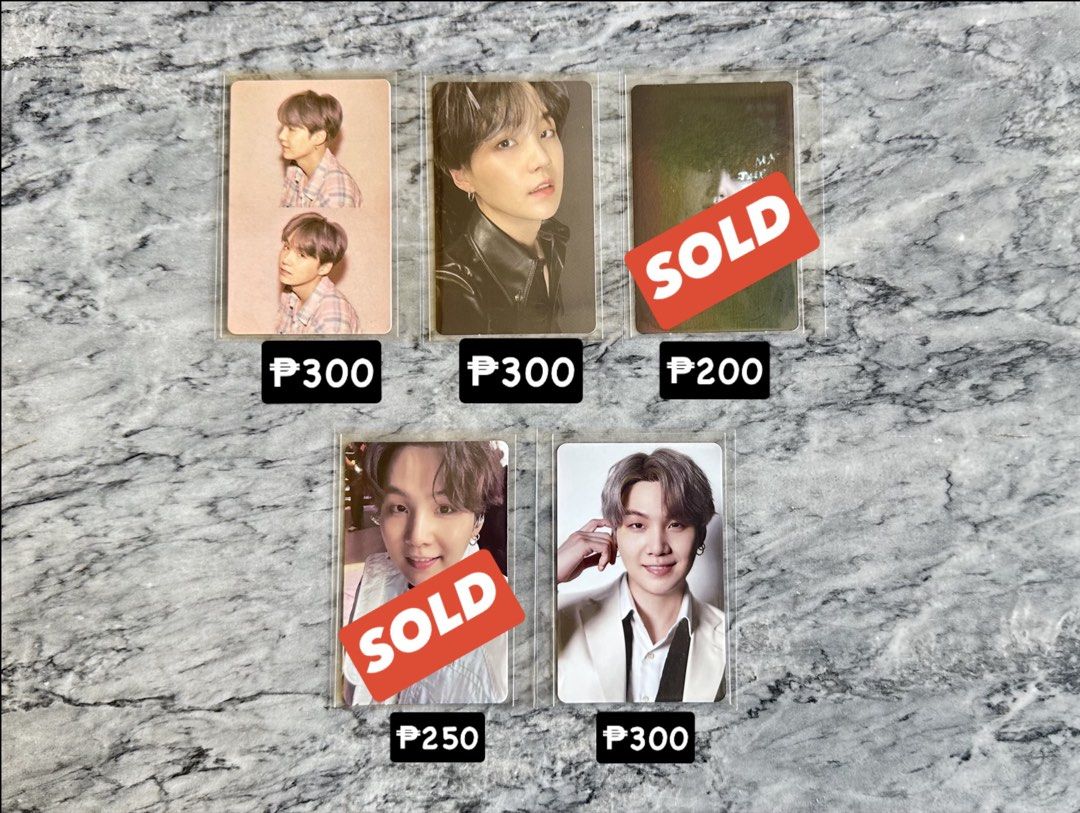 BTS Suga Photocards - MOTS (Category: K-Wave Merchandise) located in Batangas. Submitted by porscheanillo (Listing ID 1462920356, Image 1). Description: - Official BTS Suga photocards - All cards are in protective sleeves - Prices: - Top left (2 cards): P300 - Top middle: P300 - Top right: P200 - SOLD - Bottom left: P250 - SOLD - Bottom right: P300 - DM for bundle deals or inquiries!.