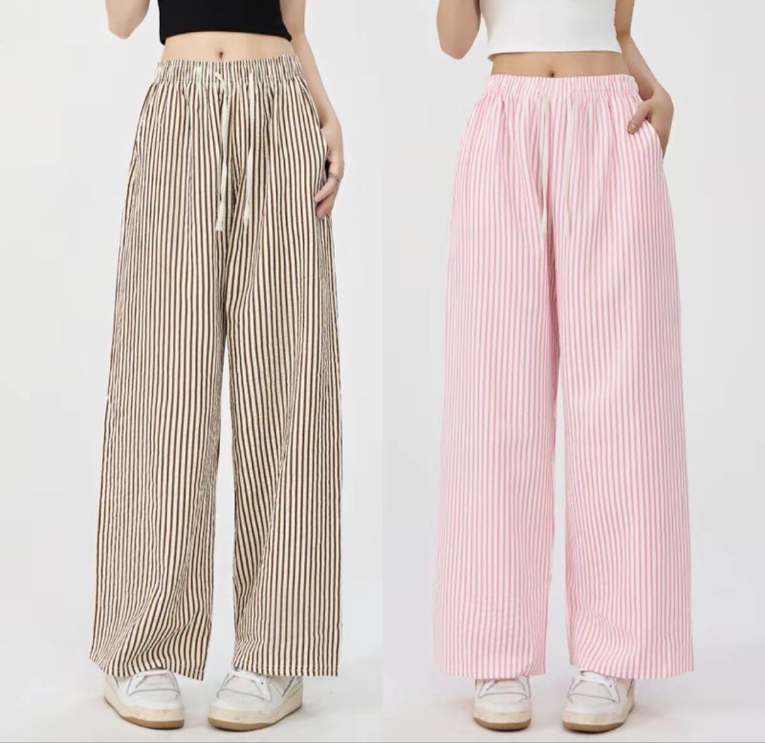 Bundle Striped Wide Leg Pants (Brown & Pink) (Category: Jeans) located in Paranaque City. Submitted by shopnrepeat_ (Listing ID 1463830085, Image 1). Description: Free Size never used - Comfy wide leg pants - Vertical stripe pattern - Available in brown and pink - Elastic waistband with adjustable drawstring - Side pockets - Lightweight material - Ideal for lounging or casual outings.