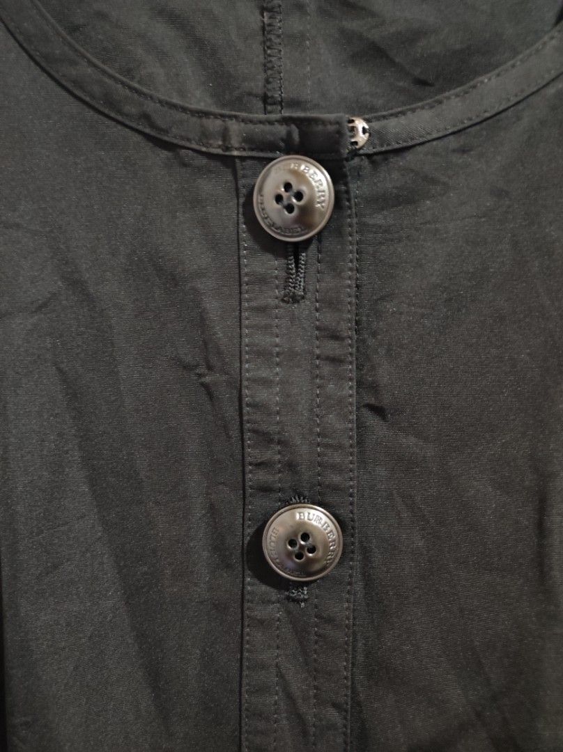 Authentic Burberry Blue Label Coat (Category: Coats, Jackets and Outerwear) located in Tagum. Submitted by sirenandsilk (Listing ID 1463790620, Image 3). Description: This is a Burberry Blue Label three-quarter sleeve cotton shirt dress in black..