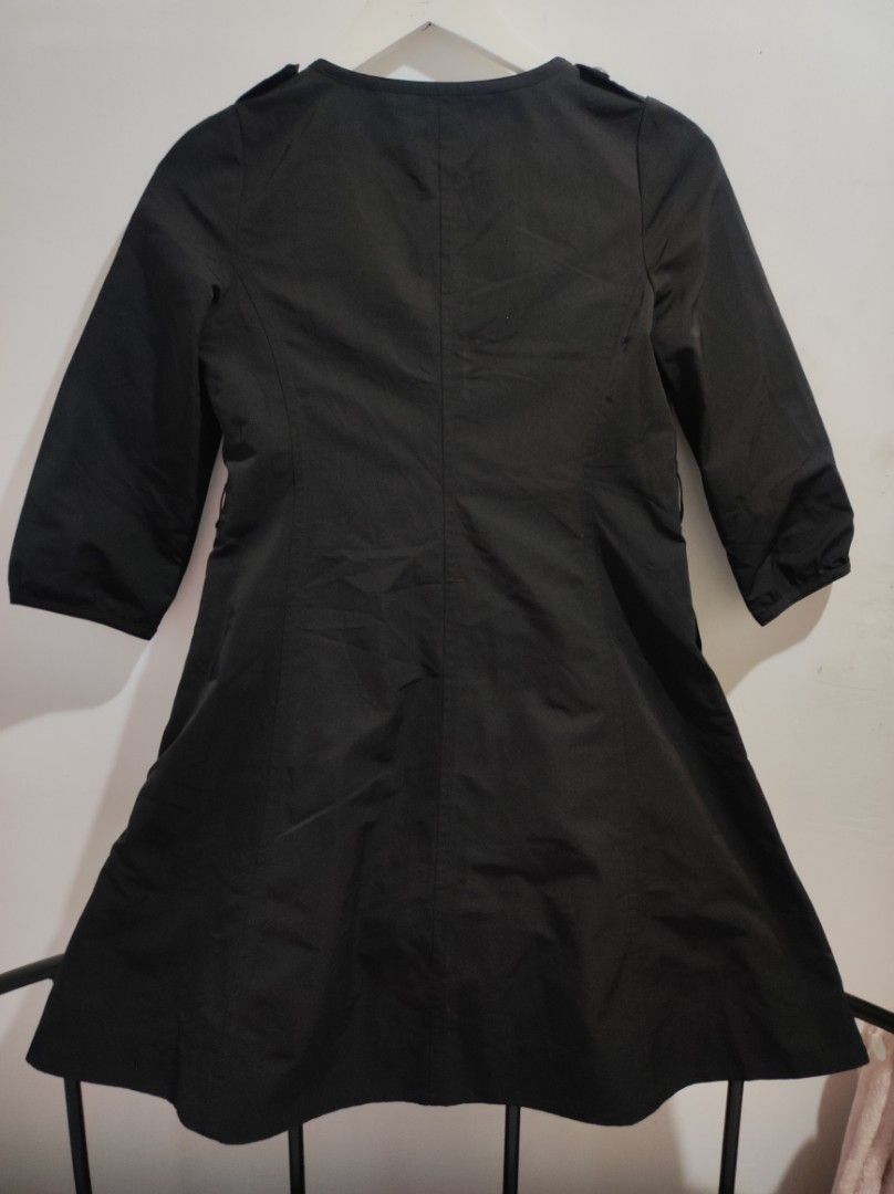 Authentic Burberry Blue Label Coat (Category: Coats, Jackets and Outerwear) located in Tagum. Submitted by sirenandsilk (Listing ID 1463790620, Image 2). Description: This is a Burberry Blue Label three-quarter sleeve cotton shirt dress in black..