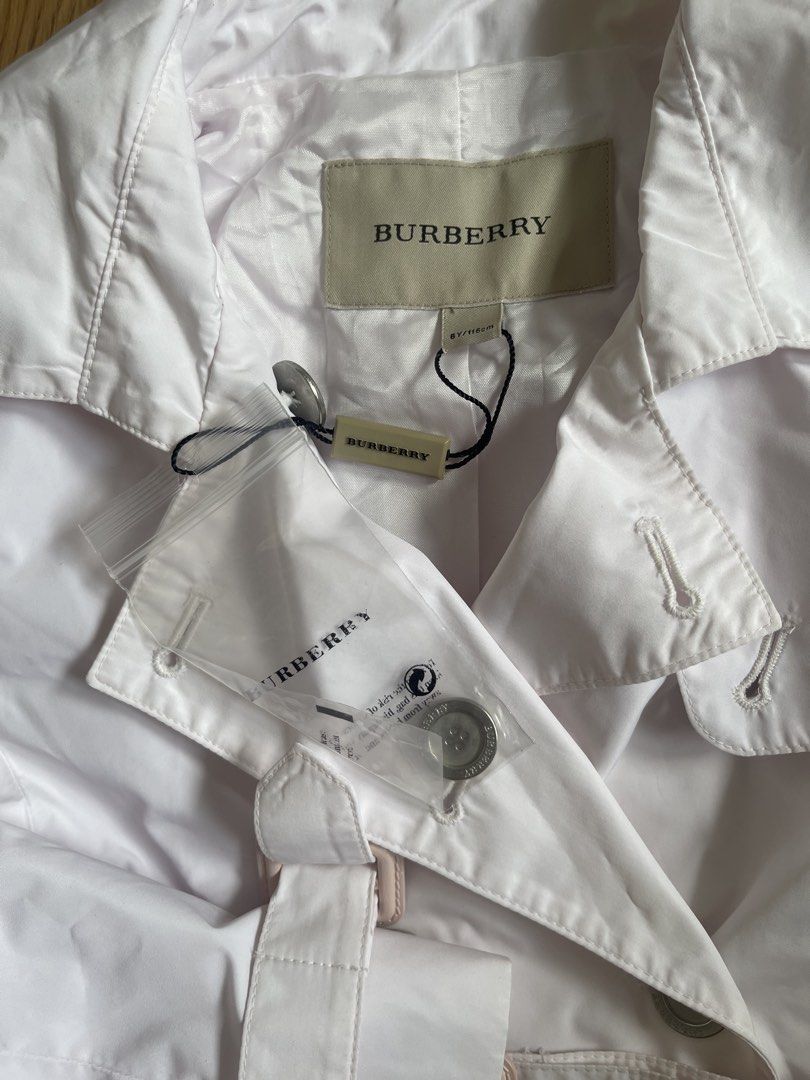 Burberry coat 6y/o (Category: Babies & Kids Fashion) located in Quezon City. Submitted by booktt (Listing ID 1463820490, Image 3). Description: Burberry coat for 6yr old parang pinkish tint than pure white bought here at carousell 900 not sure if auth, pls self authenticate 😃.