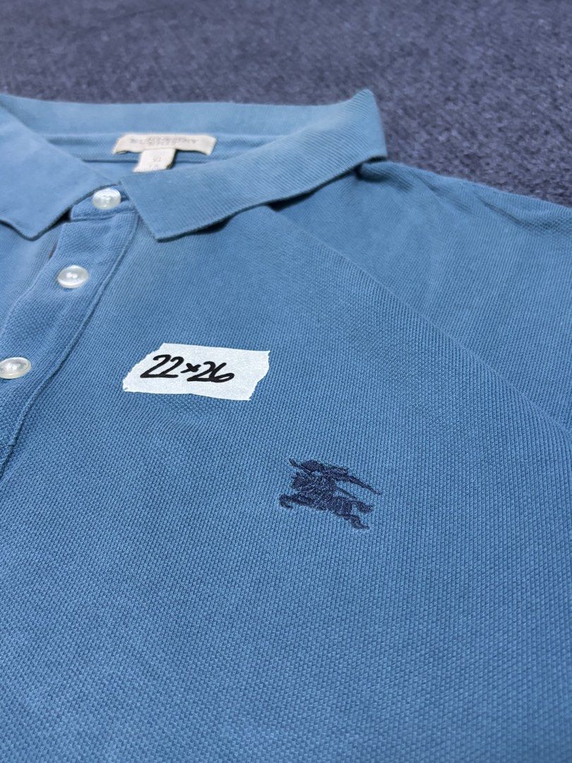 Burberry polo shirt (Category: Tshirts & Polo Shirts ) located in Baguio. Submitted by baguio_streetwear_2600 (Listing ID 1463872250, Image 2). Description: - Stylish brown tote bag - Durable canvas material - Spacious interior - Classic and versatile design.