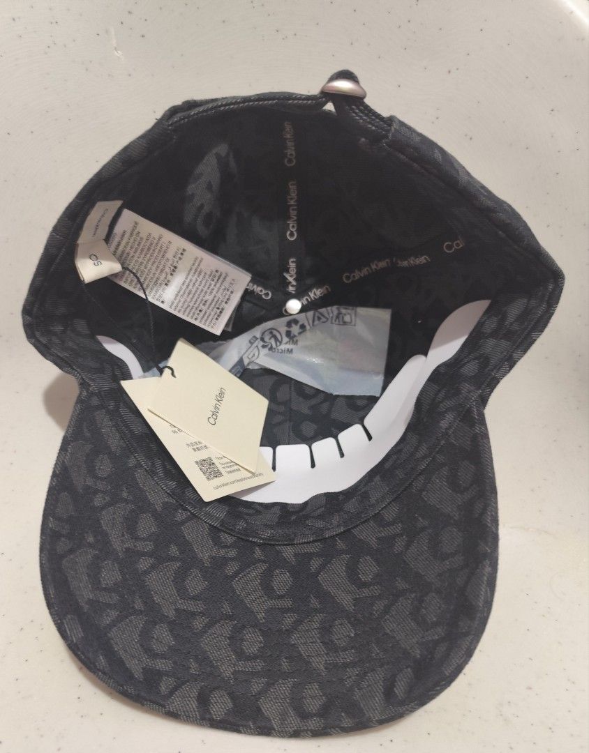 Calvin Klein Monogram Baseball Cap (Category: Caps & Hats) located in Imus. Submitted by jmakati22717201 (Listing ID 1463884605, Image 2). Description: - Classic black cap - All-over CK monogram pattern - Adjustable strap at the back for a perfect fit - Comes with original tags - Ideal for everyday wear.