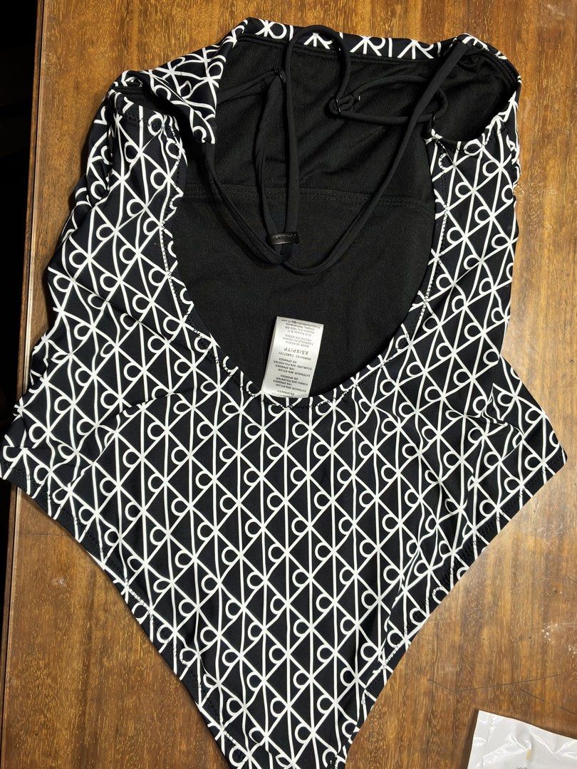 Calvin Klein One Piece Swimsuit (Category: Bikinis & Swimsuits) located in Manila. Submitted by blibrii (Listing ID 1463766494, Image 2). Description: No Price Tag, But care labels are included. No cup is included but there is a hole you can insert it in. Price is Negotiable, Please DM me as well if you want to see a look reference Size XS S M.