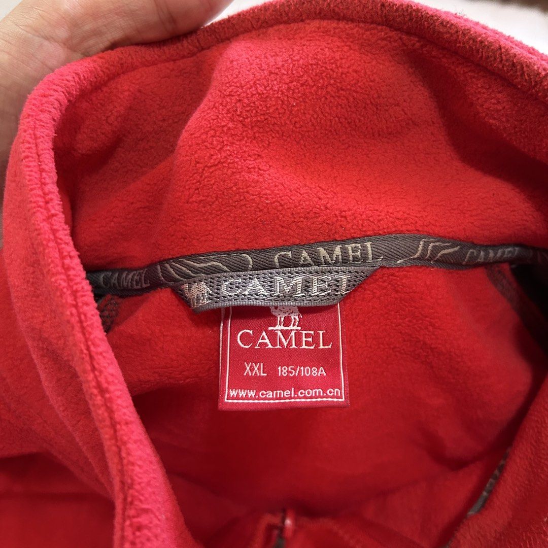 Camel Fleece Jacket Red Grey 🔥 (Category: Coats, Jackets and Outerwear) located in Jinoba-an. Submitted by eegiboy (Listing ID 1463776087, Image 3). Description: - Red and grey Camel fleece jacket - Size XXL - Full zip front - Two zip pockets - Warm and comfortable fleece material - Ideal for layering, standalone wear, outdoor activities, or casual outings Wts: Camel sherpa jacket 🔥 Size: Xl-xxl Dimes: 24/29 Excellent condition 🥰 Needwash 😉 6