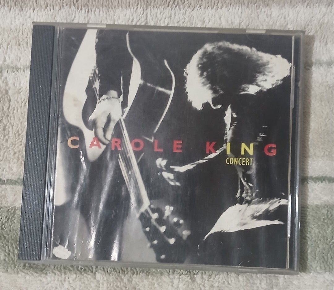 Carole King "Concert" Live CD (Category: CDs & DVDs) located in Manila. Submitted by miczngrz (Listing ID 1463895642, Image 1). Description: - Carole King Live Concert CD - Price: 450 (buy 2 or more CDs from my listing to get discount) - Released in 1994 - Includes hit songs like "Natural Woman" and "Locomotion" - Full tracklist available in photos - A must-have for any Carole King fan!.