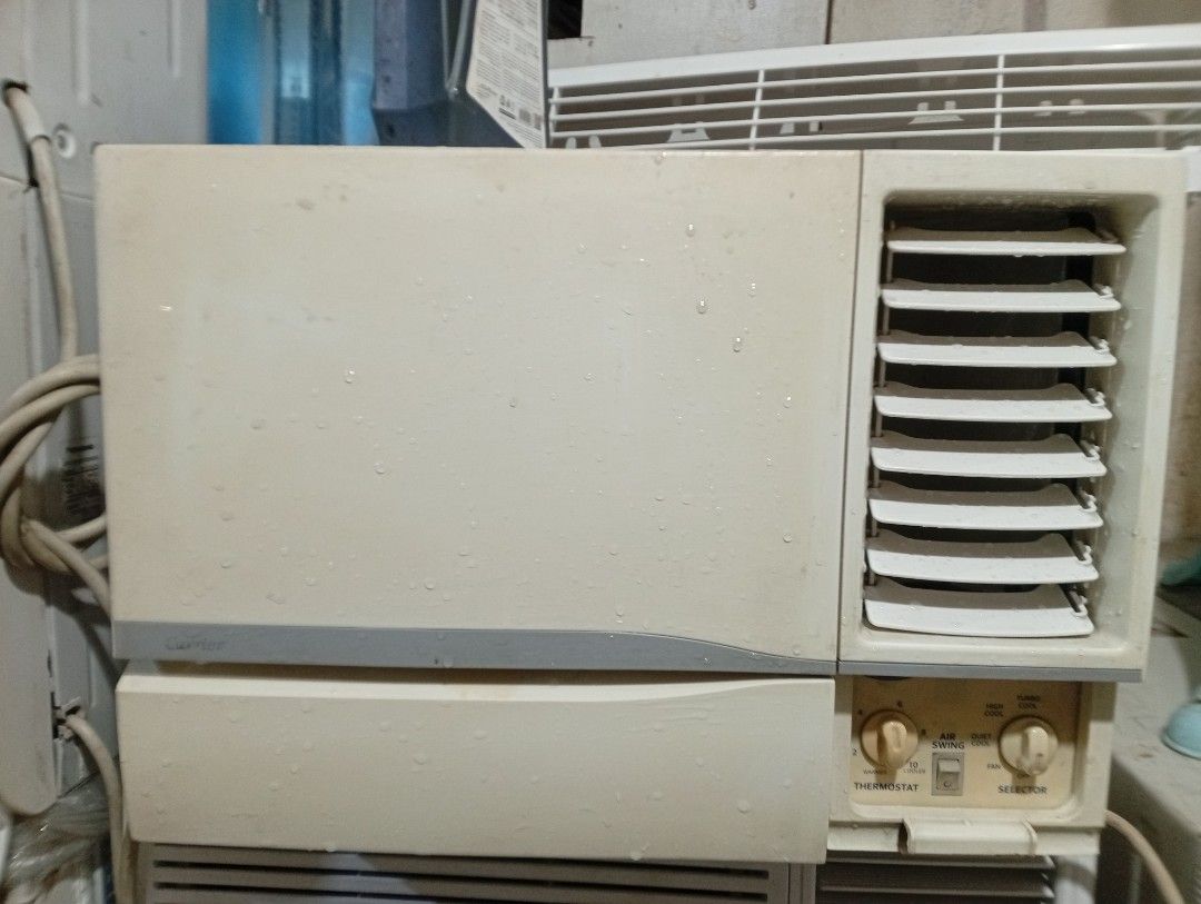 Carrier Window Air Conditioner (Category: Air Conditioning and Heating) located in Manila. Submitted by jov2424 (Listing ID 1463915218, Image 1). Description: - Carrier window air conditioner - Beige color - Adjustable vents for directional cooling - Thermostat control for precise temperature - Multiple fan and cool settings - Power cord included - Ideal for cooling down rooms - Note: Some water droplets present on the unit.