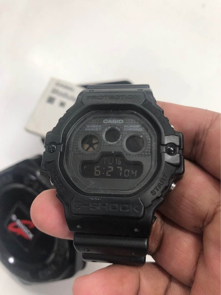 Casio G-Shock Watch Module No. 5158 (Category: Men's Watches) located in Mandaluyong City. Submitted by ajandriah.s (Listing ID 1463749823, Image 3). Description: - Authentic Black Casio G-Shock Watch - Module Number: 5158 - Condition: Good working order - Features: Water Resistant (20 BAR), Shock Resistant - Includes: Original G-Shock tin and user manual - Ideal for: Everyday wear, sports, and outdoor activities.