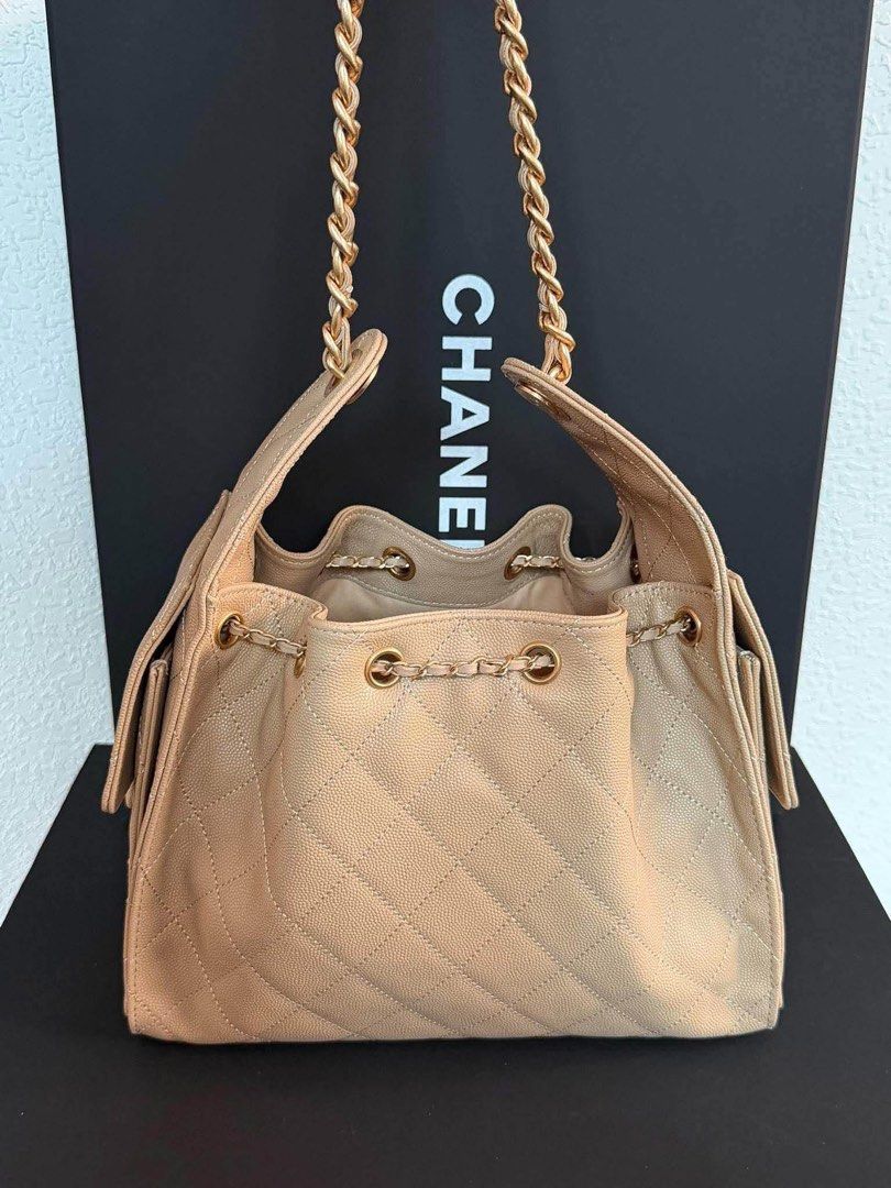 CC25 Drawstring Shoulder Bag (Category: Luxury Bags & Wallets) located in Manila. Submitted by bagsandmanymanymore1 (Listing ID 1463795612, Image 2). Description: CC25 Shoulder Bag Size 26cm Small Beige color Rare to find What you see is what you get Caviar leather materials Please read before you order 👉🏻❗️Payment first before shipping ❗️Cut off time of payment 11am sameday delivery ❗️NO MEET UP / NO PICK UP ❗️ORDER CANNOT BE CANCELLED ❗️PLEAS
