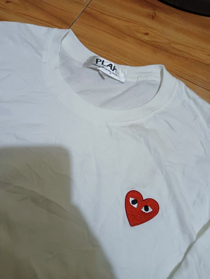 CDG LONGSLEEVE (Category: Coats, Jackets and Outerwear) located in Mendez-Nunez. Submitted by joziahshen09 (Listing ID 1463865996, Image 2). Description: ⚡ CDG LONG SLEEVE ⚡ MINE: 250 ⚡good fittings! ⚡embroidered design ⚡with tags ⚡DIMES (inches 0 start) W- 19 L- 26.
