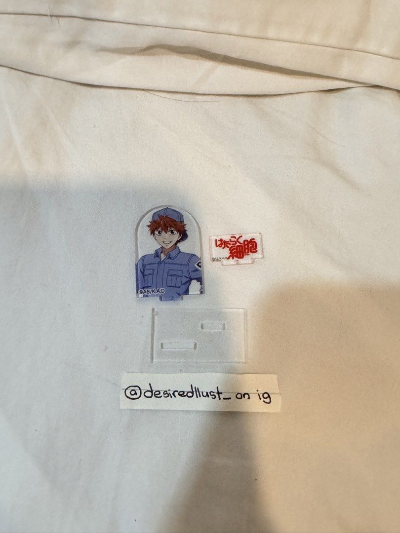 Cells at Work! White Blood Cell Acrylic Standee (Category: Character Goods) located in Quezon City. Submitted by desiredllust_ (Listing ID 1463895000, Image 1). Description: - Adorable White Blood Cell acrylic standee from Cells at Work! - Comes with a sturdy base for easy display. - Includes a special bonus acrylic charm featuring the anime logo. - A must-have collectible for any Cells at Work! fan. - Ideal for decorating your desk, shelf, or an