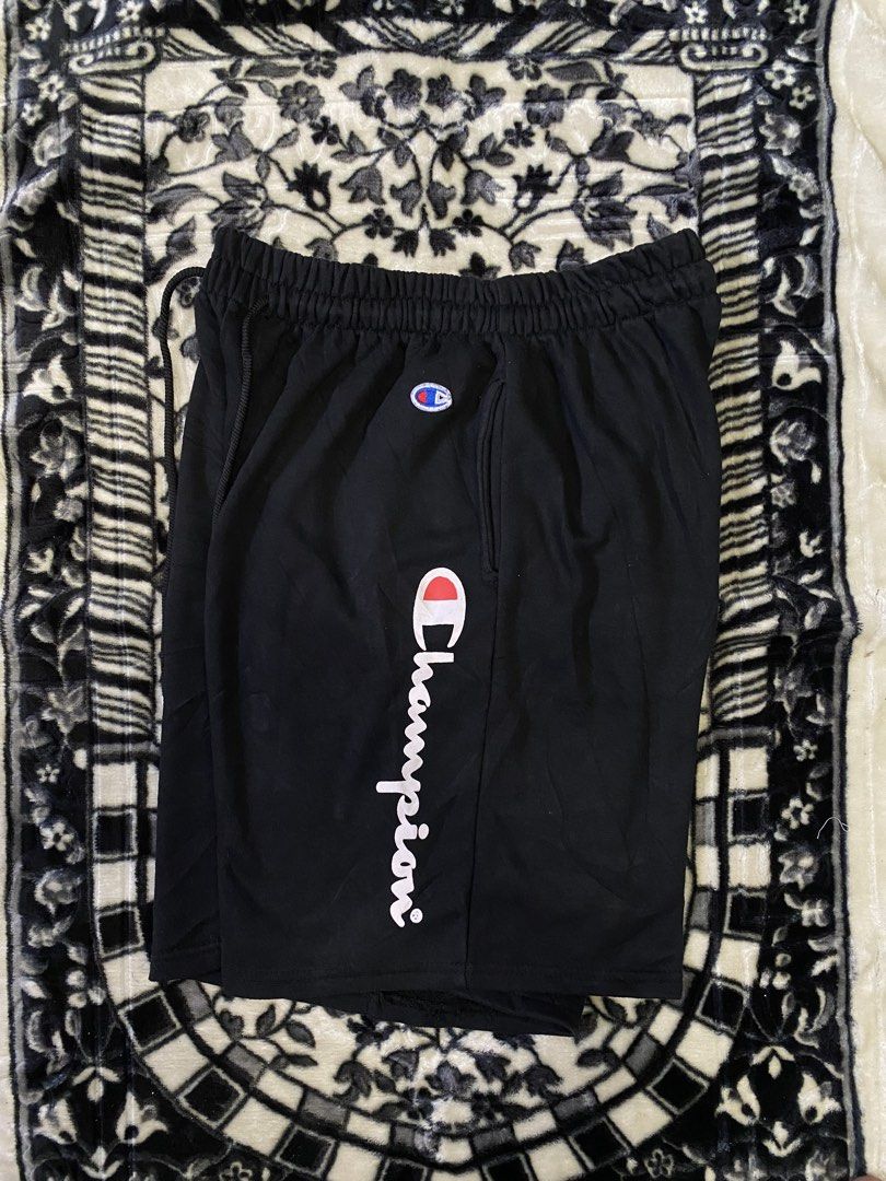 Champion Black Shorts Size Large (Category: Shorts) located in Sebaste. Submitted by phak.thrifts (Listing ID 1463849833, Image 2). Description: - Brand: Champion - Color: Black - Size: Large (L) - Features: Elastic waistband with drawstring - Design: Classic Champion logo on the side - Ideal for: Casual wear, sports activities.