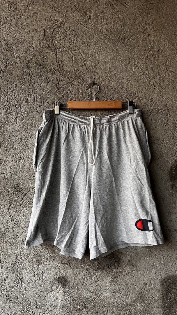 Champion Grey Athletic Shorts Size M (Category: Shorts) located in Cabuyao City. Submitted by bulandos (Listing ID 1463862461, Image 3). Description: - Grey Champion Shorts - Size: Medium - Elastic waistband with drawstring - Classic Champion logo on left leg - Comfortable cotton-polyester blend - Ideal for lounging and workouts.